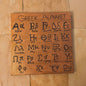 Greek Alphabet Print on Bronze Canvas - Paths and Places